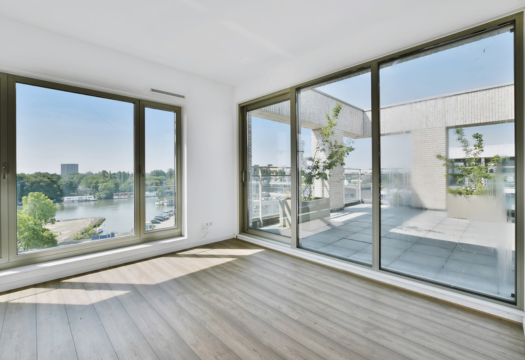 Floor-to-ceiling glass windows and sliding doors