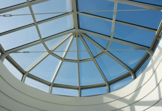 Custom glass skylight installation for natural lighting